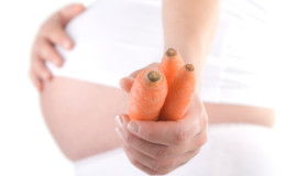 In what trimester is it useful to eat carrots during pregnancy