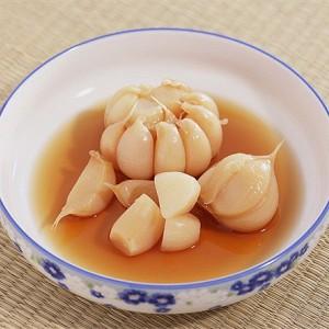 How to cook pickled garlic for the winter with cloves: top 15 easiest and most delicious recipes