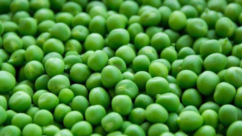Next to which crops is it better to plant peas