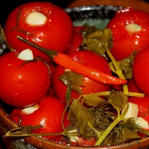 How to cook delicious pickled tomatoes for the winter: a selection of the best recipes from experienced housewives