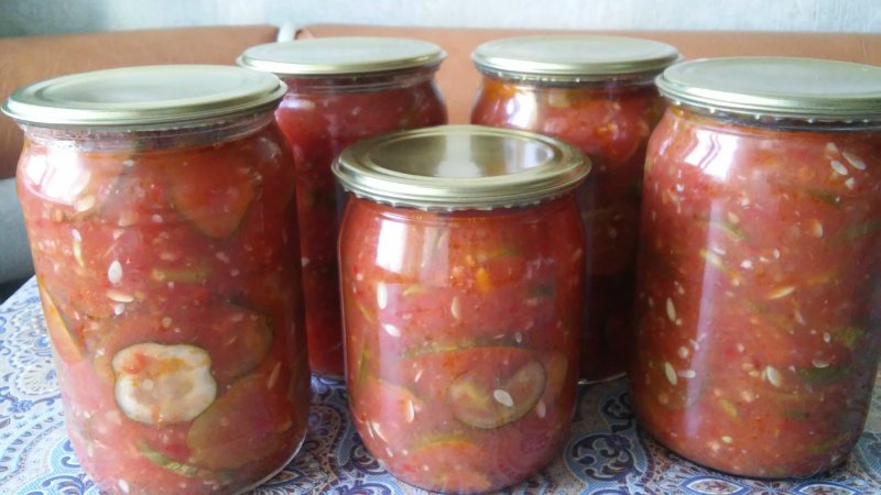 The most delicious recipes for pickling cucumbers in tomato sauce for the winter