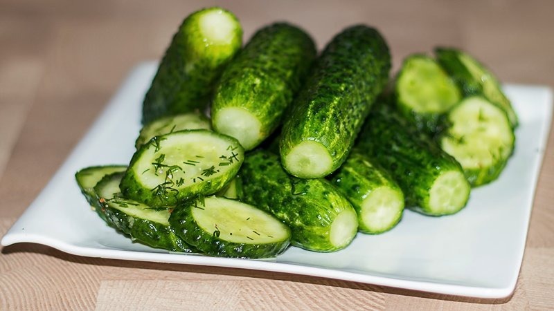 Delicious crispy lightly salted cucumbers: how to cook with cold pickle