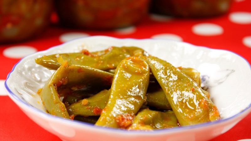Do-it-yourself savory snacks: cooking pickled hot peppers for the winter with butter