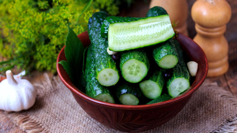 The classic recipe for lightly salted cucumbers in a saucepan with hot brine