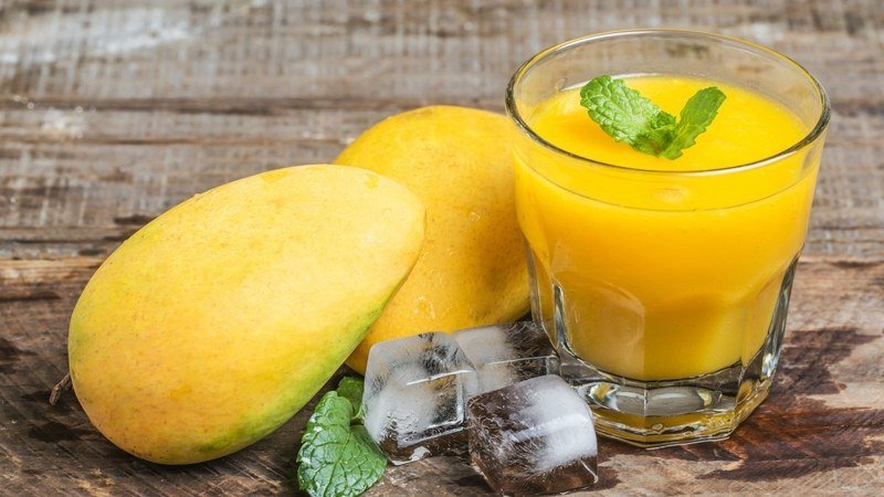 What is the harm and benefits of mango for a woman's body
