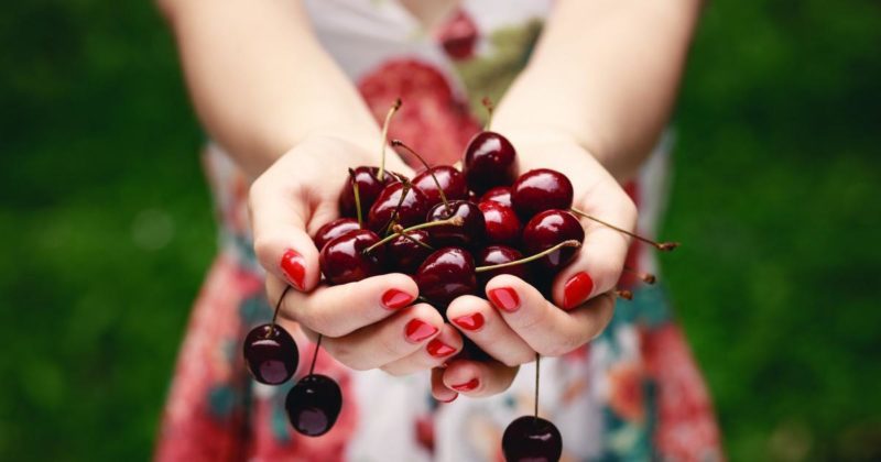 Why are cherry berries useful for a woman's body